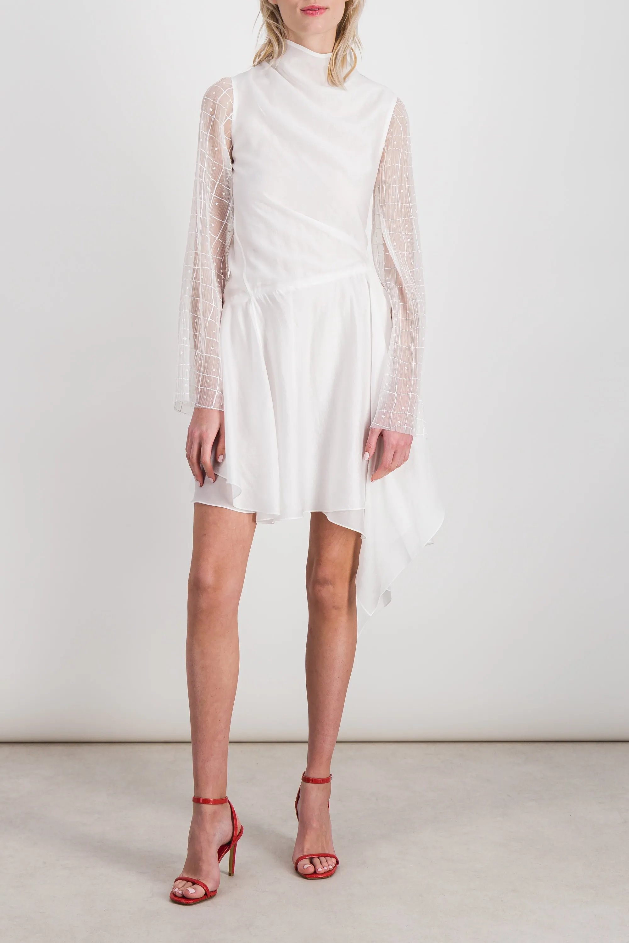 Fluid asymmetric dress with sheer trumpet sleeves